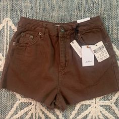 Subdued Vintage Crop Lightweight Denim Shorts With Raw Edge Hems In Brown. Size 25. Actually Waist Measurement Is Just Over 24”. Also Says Usa Size 2/4 On The Tag. Brand New With Tags. Trendy High Waist Brown Jean Shorts, Casual High Waist Brown Jean Shorts, Casual Brown High Waist Jean Shorts, Casual Brown Jean Shorts, Brown Cutoff Shorts For Summer, Summer Cutoff Brown Shorts, Trendy Brown Cotton Jean Shorts, Brown Jean Shorts For Spring, Brown Denim Shorts For Spring