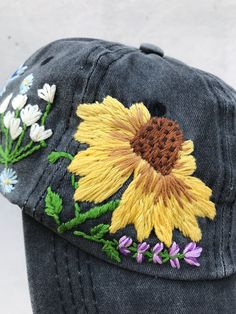 Hand Embroidered Hat is the best gift for her! 🌿 PLEASE NOTE THIS HAT IS READY TO SHIP🌿 Color: a black baseball cap. Design: hand embroidered echinacea with wildflowers. Cap size (head circumference): 55 - 62 cm. GET 10% OFF YOUR 1ST ORDER! Get a 10% off coupon code for our Etsy shop by signing up to our mailing list eepurl.com/gefZy5 CHECK OUR OTHER ACCESSORIES 🌸More Baseball hats: https://www.etsy.com/shop/KazkovaEmbroidery?ref=seller-platform-mcnav&section_id=25392998 🌿Kids Baseball h Embroidered Cotton Hat As Gift, Embroidered Adjustable Baseball Cap Gift, Adjustable Embroidered Baseball Cap Gift, Spring Embroidered Hat For Gift, Embroidered Flower Shaped Hat, Embroidered Baseball Cap Gift, Embroidered Trucker Hat With Curved Brim, Embroidered Flower Baseball Cap, One Size, Embroidered Festival Cap