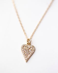 14K Yellow Gold Small Diamond Pave Heart Charm Necklace Must have perfect sized small genuine diamond pave heart charm on a delicate chain. super sparkly! Entire necklace is made of 14k gold. Heart charm measures about 11mm * First sample picture has 2 heart layered THIS LISTING IS FOR THE SMALLER HEART Please convo us if any further questions or would like to purchase the bigger heart necklace Diamond Charm Necklace With Heart Pendant, Diamond Heart Pendant Necklace With Charms, Diamond Charm Necklace With Single Cut Diamonds As Gift, Diamond Charm Necklace With Single Cut Diamonds, Heart-shaped Diamond Charm Necklaces For Anniversary, Heart-shaped Diamond Charm Necklace For Anniversary, Fine Jewelry Diamond Heart Pendant Charm Necklace, Gold Heart Necklace With Single Cut Diamonds For Gift, Gold Heart-shaped Diamond Charm Necklace