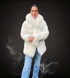 STUNNING UNISEX WHITE BABY ALPACA FUR COAT Styled and glamorous Baby Alpaca fur coat handmade of 100% genuine baby alpaca fur. Value for money is what every buyer seeks to achieve when buying any item. In the recent past, fur coats have gained popularity, and everyone wants to have as many of these as they can afford. Indeed, the coats are luxurious and investment because of many reasons. Size available: XS - S - M - L - XL - XXL Material: 100% baby Alpaca fur. Garment Type: fur coat Washing Ins White Sheepskin Fur Coat For Fall, White Sheepskin Outerwear With Faux Fur Trim, White Fluffy Elegant Fur Coat, Elegant White Fluffy Fur Coat, White Luxury Sheepskin Fur Coat, Luxury White Sheepskin Fur Coat, Luxury White Outerwear With Faux Fur Lining, White Fluffy Long Sleeve Fur Coat, Luxury White Fur Coat For Winter