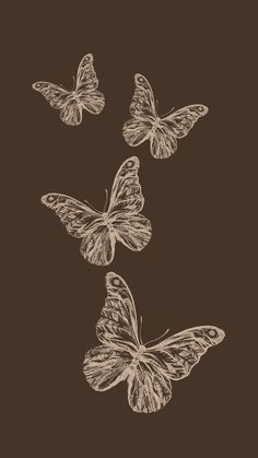 three butterflies flying in the air on a brown background with white ink and black lettering