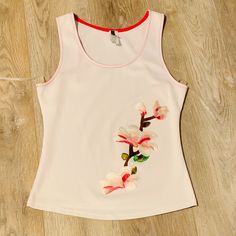 PALACIO Women's Embroidered Top Size Medium Sleeveless Orchid Like New In excellent condition. Very pretty top with embroidered orchids on front. Hand wash cold. White Fitted Tank Top With Floral Embroidery, Fitted White Tank Top With Floral Embroidery, Fitted Floral Embroidery Tank Top, Fitted Floral Embroidery Tank Top For Spring, Fitted Tank Top With Floral Embroidery, Casual Fitted Vest With Floral Embroidery, White Floral Embroidery Vest For Spring, Pink Sleeveless Top With Floral Embroidery, Womens Tank Tops