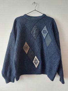 Vintage Retro Sweater, 80s Knitwear, Unisex Jumper,  80s Pullover, Vintage Grey Knitted Sweater, Grandpa Sweater, Archive Clothes with patch There is no composition tag, but I think it's wool MELKA Color navy blue Size L but see measurements  All measurements taken with garment laid flat: Chest 67cm / 26,37 in Lenght 63cm / 24,80 in Shoulders 67cm / 26,37 in Sleeve lenght 51cm / 17,71 in Condition used good 80s Knit Sweater, Retro Patchwork Knit Sweater, Retro Patchwork Sweater For Winter, Retro Patchwork Winter Sweater, Retro Textured Knit Winter Sweater, Oversized Vintage Cable Knit Sweater, Retro Knitted Sweater For Cold Weather, Vintage Winter Patchwork Tops, Vintage Crew Neck Knit Sweater