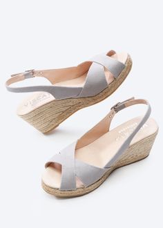 These stylish and flirty Llansa canvas wedges have a flattering slingback heel, an elegant buckle and soft cotton, 100% organic canvas for a comfortable, luxurious fit. And with a gorgeous 2 ½” heel, they’re comfortable enough to get you from sunny days to stylish nights. TOP TIP: STYLING Sexy and stylish, these handmade espadrille wedges feature eco-friendly jute soles for natural breathability, the perfect party shoes for those hot summer evenings. TOP TIP: SIZING If you are an in-betweener tr Medium Wedges, Sandal Wedges, Sell Shoes, Comfortable Wedges, Wedge Espadrilles, Mens Uggs, Platform Slippers, Espadrille Sandals, Slingback Heel