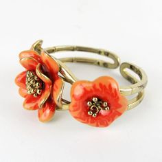 Gorgeous vintage articulated bracelet with enameled flower.       Condition:  Very good preowned condition.  Creator: -  Materials and Techniques:  metal, enamel  Marks:    Date (~):  1960s  Place of Origin:  France  Measurements: Diameter interior 5,5 cm, middle flower 3,5 cm  Weight: circa 70 gr Unique Enamel Flower Shaped Jewelry, Unique Enamel Flower Jewelry, Vintage Adjustable Flower Ring For Spring, Adjustable Vintage Flower Ring For Spring, Vintage Nickel-free Jewelry For Spring, Vintage Bracelet Jewelry For Spring, Vintage Spring Jewelry Nickel Free, Vintage Spring Bracelet Jewelry, Vintage Spring Jewelry Bracelet