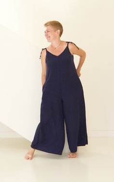 "This loose jumpsuit is the most comfy outfit you have worn ever! Flattering and flowy cut fits pretty much any size. Natural linen is a cool wear on a warm summer day. Choose from 30 colors palette to have outfit for particular occasion. For example - light or bright color for tropical vacation, neutral - as loungewear, dark-rich - for cozy dinner out or city strolling. Just switch on your imagination! If you want this jumpsuit in our exclusive linen colors, please follow this link: https://www Linen Jumpsuits And Rompers With Pockets, Relaxed Fit Linen Jumpsuit With V-neck, Linen Jumpsuits And Rompers For Loungewear, Linen Wide Leg Jumpsuits For Beach, Linen Wide-leg Jumpsuits For Beach, Beach Linen Wide Leg Jumpsuits And Rompers, Wide Leg Linen Jumpsuits And Rompers For Beach, Wide Leg Linen Jumpsuits And Rompers, Jumpsuit Linen