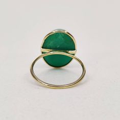 You can choose your own gem in my store. Let me know if you would like to see options Details of the ring Gem: Chrysoprase Gem shape & size: oval & 16×12mm Gold purity: 14K (58.33% approx.) Gold weight: 1.01 grams total weight of ring: 2.73 grams Fine cabochon Chrysoprase oval shape gemstone ring set in solid 14K yellow gold. The Gold purity is guaranteed and it comes with authentic 14 kt gold hallmark. Since these Rings are handmade, Same matching oval shape design earrings & pendan Green Oval Opal Ring With Bezel Setting, Chrysoprase Gemstone Ring For May Birthstone, Green Oval Cabochon Ring With Bezel Setting, Chrysoprase Emerald Ring In Fine Jewelry Style, Polished Chrysoprase Ring Suitable For Gift, Oval Green Enamel Ring With Gemstone, Yellow Gold Rings With Chrysoprase Gemstone, Oval Green Onyx Gemstone Ring, Green Oval Enamel Ring With Gemstone