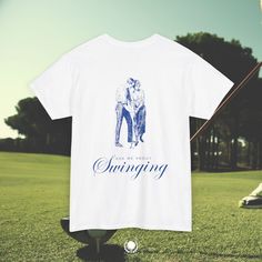 THE FIT - Comfortable unisex fit - 100% heavy cotton - Professional high quality print - Comfy, relaxed wear with thick crew neckline - Gildan shirt (boxy fit) Prepare to turn heads and spark conversations with our "Ask Me About Swinging" vintage golf t-shirt. This isn't just a shirt; it's a playful nod to your refined tastes.  Because in the world of golf and beyond, a little intrigue goes a long way. Golf T-shirt With Graphic Print And Short Sleeves, Relaxed Fit T-shirt With Screen Print For Sports Events, Cotton Branding Golf T-shirt, Sports Crew T-shirt With Screen Print, Cotton Golf T-shirt With Branding, Cotton Golf Top With Logo Print, Golf T-shirt With Letter Print And Crew Neck, Golf Graphic Print Crew Neck T-shirt, Sporty Golf T-shirt With Graphic Print