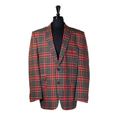 This Chiragh Apparel Blazer Is An Elegant Upgrade On Dapper Tailoring And Features Rich Shades In A Sumptuous Fabric For Elegant Opulence. Fashioned From Premium Quality Wool, This Tartan Plaid Blazer Features Full Lining In Japanese Silk, A Notch Lapel, Two-Button Closure And Single-Vented Back. A Left Chest Pocket And Three Flap Pockets Appoint The Front While The Inside Has Two (2) Pockets On The Left And One (1) Pocket On The Right. A Flash Of Colored Piping Is Added To The Jacket Lining Ins Jacket Lining, Mens Blazer, Elegant Blazers, Formal Suit, Japanese Silk, Red Tartan, Formal Suits, Plaid Blazer, Wool Dress