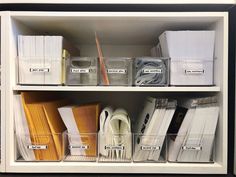 the shelves are filled with files and file folders