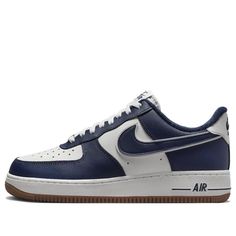 The Nike Air Force 1 '07 LV8 'College Pack Midnight Navy' is a classic silhouette with a modern twist. Featuring a white rear overlay with a chestnut-colored Swoosh, navy embroidery, and a double-knit pattern, this shoe is finished off with a fleece sock liner and a classic rubber sole. The sneaker is perfect for everyday wear, whether you're hitting the streets or the court. Inspired by the college lifestyle, this shoe is part of the College Pack series and is sure to turn heads. The iconic sil Navy Nike Shoes, Gum Brands, Navy Embroidery, College Packing, Back To School Shoes, Navy Blue Shoes, Nike Air Force 1 07, Navy Shoes, Nike Air Force 1 Low