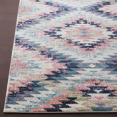 a multicolored area rug with an abstract design on the top and bottom corner