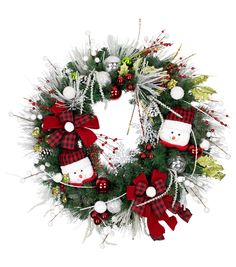 a christmas wreath with red and white decorations