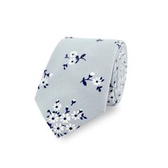 SPECIFICATIONS Floral Pattern Blue & Navy Floral Print Tie 100% Luxurious Soft Cotton Handmade Dry Clean Only DIMENSIONS Tie Length - 145cm Tie Width - 7cm (At widest point) Pocket Square - 25cm x 25cm Adult Bowtie Length - Adjustable to fit up to neck size 20inches Adult Bowtie Width - 12cm Child Bowtie Length - Adjustable to fit up to neck size 15inches Child Bowtie Width - 10cm INFORMATION We are a 5-star rated, professional Etsy seller based in the UK, shipping globally. Most orders are desp Classic Suit And Tie Accessories For Spring Wedding, Gray Wedding Tie, Classic Gray Tie For Wedding, Blue Classic Wedding Suit And Tie Accessories, Blue Fitted Suit And Tie Accessories For Wedding, Elegant Light Blue Suit And Tie Accessories For Wedding, Blue Wedding Ties, Wedding Outfit Groom, Floral Ties