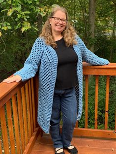 One of a kind no button extra-long cardigan crocheted in country blue! Washable (gentle cycle, low heat dry) Measurements: Chest: 44 in Length: 44 in Free Shipping! For more unique handmade sweaters, click here: https://www.etsy.com/shop/ChristianneCrochets?ref=seller-platform-mcnav&section_id=31124024 See all the handmade items available in my shop: https://www.etsy.com/shop/ChristianneCrochets Cardigan With Holes, Granny Cardigan, Extra Long Cardigan, Handmade Sweaters, Handmade Cardigan, Cyan Colour, Cardigan For Women, Handmade Sweater, Country Blue