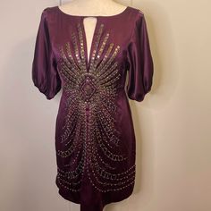 Nanette Lepore Darjeeling Beaded Purple Silk Dress. Size: 2 Brand New. All Beads Attached. Beautiful, Embellished Detail All Along The Front, Bottom, And Sleeve Of Dress. Great For Date Night It Has All The Extra Beads Attached To The Dress However The Tag Price Is Removed Arm Pit To Arm Pit 15 1/2 Length 31 3/4 Knee-length Embellished Mini Dress For Party Season, Holiday Formal Embellished Mini Dress, Embellished Knee-length Mini Dress For Evening, Knee-length Embellished Mini Dress For Wedding, Embellished Knee-length Mini Dress For Wedding, Embellished Mini Dress For Festive Occasions, Embellished Mini Dress For Festive Party Season, Festive Embellished Mini Length Dresses, Fitted Silk Mini Dress Embellished