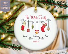 personalized christmas ornament hanging from a tree