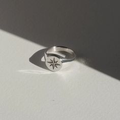 Starburst Signet Ring – Futaba Hayashi Minimalist Oval Signet Ring For Promise, Symbolic Signet Ring With Engraving For Promise, Adjustable Sterling Silver Signet Ring For Promise, Gift Signet Ring With Compass Design, Vintage Sterling Silver Signet Ring For Promise, Engraved Sterling Silver Signet Ring For Everyday, Symbolic White Gold Signet Ring For Promise, Minimalist Stamped Signet Ring For Promise, Minimalist Signet Ring With Engraving For Promise