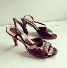 "Vintage 60s Dark Brown Ankle Strap Open Toe Heels by Amano These come from an estate of size 7 1/2 to 8 narrow shoes. I see an 8 written in however they fit smaller than 8, I wear a 6 and they fit well in front but the strap is too loose. Check measurements as these measure closer to size 6.5 possibly 7: 9 1/2\" long from inside toe to inside heel. 2\" across inner heel. 3\" across at ball of foot, inside. 3\" heel. Please see pictures for amount of wear to shoe. The soles are worn. Price refle Luxury Brown Evening Court Shoes, Vintage Brown Ankle Strap Heels, Brown Vintage Ankle Strap Heels, Vintage Heels With Heel Strap For Formal Occasions, Vintage Formal Heels With Heel Strap, Vintage Slingback Pumps With Heel Strap For Formal Occasions, Vintage Formal Slingback Pumps With Heel Strap, Vintage Brown Heels With Heel Strap, Vintage Pointed Toe Slingback Pumps For Summer