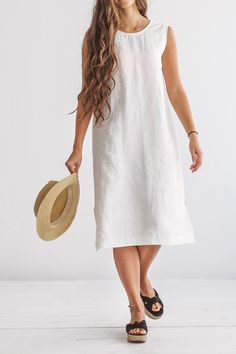 "DESCRIPTION: ♥ 100% natural European linen; ♥ safe Oeko-TEX® Standard 100 certified linen fabric ♥ softened midweight linen (185 g/m2) ♥ sleeveless dress FIT ♥ length from the lower to the upper seam is about 41.3 inches / 105 cm ♥ measurements taken from a size S ♥ model with long hair is 170 cm and wearing a size S ♥ model with shorter hair is 173 cm and wearing a size S SIZE CHART: XS: Bust 30.7\"- 32.7\" (78-83 cm) , Waist 23.6\"- 25.6\" (60-65 cm), Hips 33.5\"- 35\" (85-89 cm) S: Bust 33\" Spring Daywear Linen Dress, Casual Natural Linen Dress, Spring Linen Dress For Daywear, Spring Linen Dress For Beach, Spring Linen Midi Dress, Summer Linen Midi Dress For Daywear, Linen Summer Dress For Daywear, Linen Unlined Midi Dress For Daywear, White Linen Sleeveless Dress For Daywear