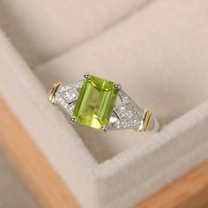 This ring features a 6mm*8mm natural peridot and sterling silver finished with gold and rhodium. Customization is available. It is made by hand, and it will take about 7 days to finish the ring after your payment is completed. Any question, just let me know. :) My shop homepage: Peridot Jewelry Rings, Spinel Jewelry, Peridot Engagement Rings, Ring My Bell, Peridot Jewelry, Etsy Wedding Rings, Dream Engagement Rings, Peridot Ring, Wedding Rings Unique