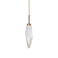 a glass light hanging from a gold colored cord