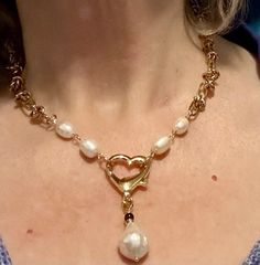 This is an elegant Pearl Necklace with a fun twist. 17 inch Chain then 2 and 1/4 inches of heart and the large pearl pendant has a sweet garnet on top.  Chain is like barbed wire. Turquoise Ankle Bracelet, Barbed Wire, Silver Flowers, Ankle Bracelets, Baroque Pearls, Pearl Pendant, Beaded Flowers, Pendant Necklaces, Garnet