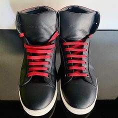 Authentic Alexander Mcqueen Leather High-Top Sneakers With Red Backing, Black Exude Undeniable Cool. They Are Crafted In Luxe Italian Leather. Hard To Come By. Leather Upper & Lining. Rubber Sole. Only Worn A Few Times To Museum Events 9/10. Purchase Comes With Dustbag, Shoebox, And Tissue. Alexander Mcqueen Red, Shoes Alexander Mcqueen, Mcqueen Shoes, Alexander Mcqueen Shoes, Hightop Sneakers, Leather High Tops, Shoe Box, Mens Shoes Sneakers, Italian Leather