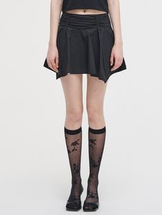 This is a trendy and feminine skirt by ETMON that is made out of high quality and sturdy material. With distinctive mood of the design and modern feminine look, you can style it for your casual daily outfit.- Natural shirring and drape detail- Unique irregular hem- Feminine and trendy look Chic Nylon Mini Skirt For Spring, Black Lined Nylon Mini Skirt, Black Nylon Mini Skirt With Lining, Pleated Asymmetrical Fitted Mini Skirt, Fitted Pleated Asymmetrical Mini Skirt, Fitted Asymmetrical Pleated Mini Skirt, Modern Mini Skirt For Spring, Spring Short Nylon Skirt, Black Short Length Pleated Skirt