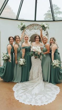 a group of women standing next to each other