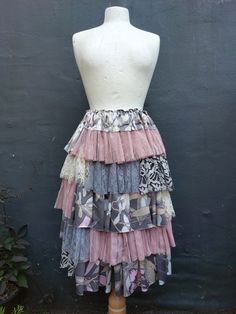 Pastel shabby chic skirt. Delicate pieces of satin and lace fabrics beautifully gathered in one piece. A lot of ruffles in blush, beige, pink and grey. Ribbon strap will help you fit the skirt according to your size. Perfect for hot summer days. Messy and romantic:)             Size XS/S/M/L Waist/ hips up to 52(133cm) Lenght  25(64cm)  Are you looking for a different size or colours?                                                                                   I will be more than happy to design something just for you. :) Bohemian Tiered Skirt With Lace Trim, Pastel Shabby Chic, Chic Skirt, Shabby Chick, Grey Skirt, Lace Fabrics, Grey Ribbon, Chic Skirts, Patchwork Skirt