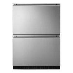 a silver refrigerator freezer sitting on top of a white wall