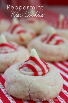 red and white striped cookies with candles in the middle are ready to be eaten or served