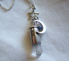 Celestial Quartz Crystal Moon and Star Silver Bullet Pendant - The scientific community began studying quartz crystals as far back as the 17th century. When pressure is applied to a crystal, energy is released in the form of heat, light and electrical voltage. Celestial Silver Crystal Necklaces For Healing, Seabees Navy, Bullet Shell Jewelry, Bullet Casing Crafts, Bullet Casing Jewelry, Bullet Crafts, Bullet Designs, Silver Jewlery, Bullet Shell