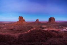 the desert is full of rock formations and dirt roads that lead through them to other deserts