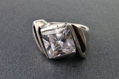 Vintage sterling silver 925 rings with rhinestone square shape.  Ring size 6.  The inner diameter is 16,5 mm.  the size of the stone is 12 x 12 mm.  the weight of the ring is 8.4 gr.   Made in Poland around the 1970-80s.   Good vintage condition. Vintage and antique items sold as-is. This is a unique thing from the last century. It can be a wonderful gift for a special person or for yourself.  It will also be a great addition to your collection.  If you love vintage items, please look in our sho Vintage Silver Ring, Vintage Silver Rings, Square Ring, Art Deco Stil, Ring Art Deco, Rhinestone Ring, Square Rings, White Rhinestone, Ring Vintage