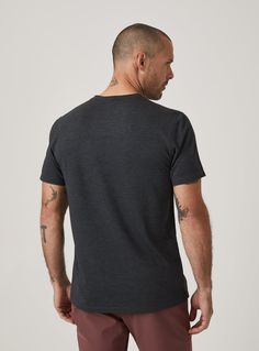 The Core™ Tee will be your most functional and sustainable tee, doubling as your new go-to t-shirt. With premium fabric and comfort, this performance shirt has 4-way stretch, moisture wicking and quick dry abilities made with up-cycled fabric. Details Model is 6'1" and wears a size medium. Care: Machine wash cold on delicate cycle, low tumble dry, do not iron Composition: 94% Polyester | 6% Spandex Technical Gray Crew Neck T-shirt, Gray Technical Crew Neck T-shirt, Technical Midweight Crew Neck Top, Midweight Technical Crew Neck Top, Black Crew Neck Top In Recycled Polyester, Quick Dry, White Undershirt, Moisture Wicking, Men's T Shirt