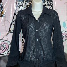 Pose Hip Longsleeve- Color(Black) This Is A Collared, Button-Up Longsleeve With A Slim Fit, Rounded Hem And Shell Buttons. It’s Made From Sheer, Stretchy Lace. Fitted Tops With Button Cuffs For Night Out, Long Sleeve Blouse With Back Button For Night Out, Long Sleeve Shirt With Buttons For Night Out, Long Sleeve Button Shirt For Night Out, Long Sleeve Shirt For Night Out, Fitted Long Sleeve Blouse With Back Button Closure, Fitted Black Blouse With Button Cuffs, Long Sleeve Blouse With Button Cuffs For Night Out, Fitted Blouse With Back Button Closure For Party