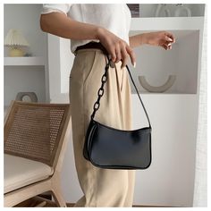 Feature: Pure color,elegant,zipper. PU leather,soft,durable. Specification: Main material: PU Size: 235*130*70mm/9.25*5.12*2.75in Color: Black, White, Yellow, Purple Straps: Single Usage: Shoulder bag, Handbag Pattern: Solid color Applicable: Women Occasions: Casual, Daily, Shopping, Travel Note: 1. Due to the different monitor and light effect, the actual color of the item might be slightly different from the color showed on the pictures. Thank you! 2. Please allow 1-3cm measuring deviation due Trendy Handheld Clutch For Office, Trendy Large Capacity Leather Clutch, Trendy Everyday Clutch With Large Capacity, Trendy Evening Bag For Office With Phone Pocket, Trendy Large Capacity Evening Bag For Everyday, Trendy Soft Leather Baguette Bag For Office, Chic Office Shoulder Bag, Trendy Large Capacity Baguette Bag For Formal Occasions, Trendy Solid Color Baguette Bag For Evening