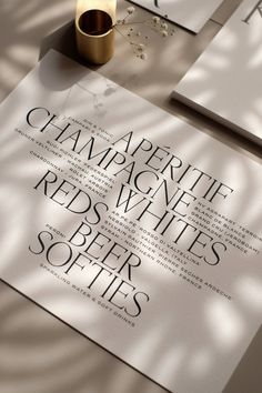 an advertisement for champagne white's red - beer softies is displayed on a table