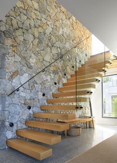 the stairs are made of wood and stone