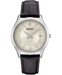 This Essential collection watch is an everyday choice with brown leather and stainless steel. From Seiko. Style #SUR421 Formal White Leather Strap For Watches, Elegant Leather Round Watch, White Gold Leather Watch With Polished Finish, White Leather Watch Accessories With Metal Dial, Elegant White Gold Watch With Leather Strap, Brown Leather Watches With Polished Finish, Brown Leather Watch With Polished Finish, Elegant Round Watch Accessories With Leather Strap, Elegant Brown Watch With Round Dial