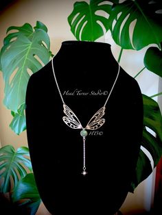 *✧･ﾟ:*Handmade Silver Magical Labradorite Flying Fairy Butterfly Wing Lariat Choker or Necklace*:･ﾟ✧* Perfect for a Fairy Princess or a Fairy Goddess! Create your own Fairy tale by making a statement and turning heads all at the same time!  This gorgeous lariat necklace is enchanting! Choice of Choker or Necklace Length *:･ﾟ･ﾟ✧💚 ✧･ﾟ: *✧･ﾟ:* ✨P R O D U C T I O N - T I M E ✨ Each pair of my lovingly handcrafted pieces is designed, assembled and packaged with the upmost care.   Please allow 1-3 business days for production. If you have a specific deadline, please let me know and I will do my best to accommodate you! ✨N A T U R A L - V A R I A T I O N ✨ Please note, these gemstones are real, and naturally formed. Each piece is innately unique and your pair may vary slightly from the product p Silver Fairy Jewelry For Festivals, Silver Fairy Style Jewelry For Festival, Fairy Style Silver Jewelry For Festival, Adjustable Fairycore Necklaces For Party, Handmade Adjustable Fairy Jewelry, Bohemian Butterfly Necklace Gift, Handmade Fairy Gold Necklace, Handmade Gold Fairy Necklace, Flying Fairy