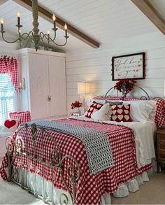 a red and white bed in a bedroom