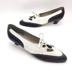 * Ghillie spectator shoes, c 1990s * Black and white leather * Long, pointed toe  * Open vamp features cord laces * Leather sole, insole and lining * Medium, curved heel Label: Unfortunately, all identifying marks or stamps are illegible  Excellent condition. Well cared for shoes with normal creasing and a few tiny nicks on the toe and heel. Please view/enlarge images for details. Inside Length: 10 1/4"  (very narrow at toe) Outer Ball Width: 3" Heel: 1 3/4"  please read... All of the other shoes at the estate sale where I purchased these were marked 8.5 narrow. I am a size 8 and tried these on to compare, since no visible size markings remain. These fit me length-wise, but are a bit too narrow for my feet.  To be certain of fit, measure a pair of your own shoes across the ball of the foot Ghillie Shoes, Spectator Shoes, Cord Lace, Vintage Black And White, Tie Shoes, Womens Oxfords, White Leather, Vintage Black, Vintage Outfits