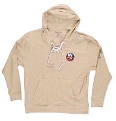 The Coastal Collection The perfect all year hoodie for New York Islanders fans. This oatmeal color hoodie is an officially licensed product of the NHL. This sweater is a mid-weight design, providing the perfect level of comfort for yearlong wear. Made from 60% cotton/40% polyester Hockey lace feature Kangaroo pouch Embroidered Islanders chest crest Sporty Tops With Drawstring Hood For Fan Merchandise, Sporty Hooded Fan Merchandise Hoodie, Fan Merchandise Hooded Top With Drawstring Hood, Casual Tops With Drawstring Hood For Fans, Casual Sports Season Hoodie For Fans, Casual Sweatshirt With Adjustable Hood For Fans, Fan Apparel Cotton Hoodie With Drawstring, Cotton Hoodie With Drawstring Hood For Fans, Casual Fleece Hoodie For Fan Merchandise