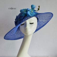 Large brim sinamay hat with sinamay flower Size: L45cm x W38cm Head size: 56.5cm also with elastic to adjust it to be smaller Ideal for wedding/party/races/church Big hat only send by EMS(don't send it by regular parcel in case any damage),EMS costs 5-12 working days to most of the countries.Suggest to buy one week earlier at least to make sure it can arrive in time. Every hat is well inspected before shipment,no return accepted.Thanks for your supports. Summer Sinamay Headpiece For Races, Summer Sinamay Fascinator For Races, Summer Blue Headpiece With Handmade Flowers, Sinamay Fascinator For Kentucky Derby Races, Blue Hats With Handmade Flowers For Royal Ascot, Formal Blue Fascinator With Handmade Flowers, Blue Brimmed Fascinator For Spring, Brimmed Blue Fascinator For Spring, Blue Short Brim Fascinator For Garden Party