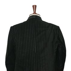 This Chiragh Apparel blazer is an elegant upgrade on dapper tailoring and features rich shades in a sumptuous fabric for elegant opulence. Fashioned from premium quality velvet, this striped blazer features full lining in Japanese silk, a notch lapel, two-button closure and single-vented back. A left chest pocket and three flap pockets appoint the front while the inside has two (2) pockets on the left and one (1) pocket on the right. A flash of contrast piping is added to the jacket lining insid Elegant Pinstripe Double Breasted Long Sleeve Suit, Pinstripe Tuxedo Suit, Elegant Pinstripe Blazer, Formal Striped Fitted Three-piece Suit, Fitted Pinstripe Outerwear For Semi-formal Occasions, Striped Long Sleeve Suits For Semi-formal Occasions, Striped Fitted Three-piece Suit For Formal Occasions, Fitted Striped Three-piece Suit For Formal Occasions, Elegant Pinstripe Blazer For Semi-formal Occasions