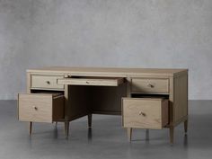 an office desk with two drawers on each side