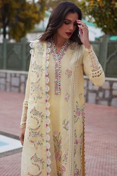 Brand: ELANProduct Code: EL24-08B ZENELCollection: ELAN Unstitched Embroidered Luxury Lawn CollectionFabric: Lawn DESCRIPTION: Introducing 'Zenel', a vision of timeless elegance crafted on soft yellow canvases, adorned with exquisite embroideries in shades of ivory, pink, sage, moss, yellow, and periwinkle. This captivating ensemble epitomizes sophistication, with intricate detailing and a harmonious color palette that exudes refinement. Paired with a gossamer dupatta boasting delicate embroidered accents, 'Zenel' promises to elevate your summer wardrobe with its ethereal charm and versatile appeal. Embrace the allure of this meticulously curated design, destined to captivate hearts and turn heads wherever you go, making every moment a masterpiece of style and grace. DESIGN DETAILS: Embroi Elan Lawn, Marriage Clothes, Eid Festival, Lace Dress Design, Beautiful Pakistani Dresses, Embroidery Suits Design, Fancy Dress Design, Stylish Dress Book, Lawn Suits